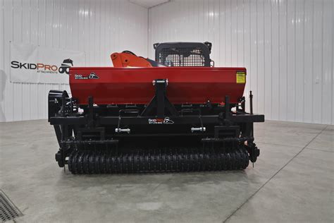 skid steer broadcast seeder|seed drill for skid steer.